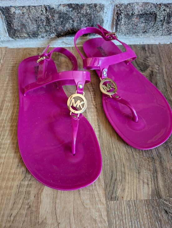 Michael Kors Shoes - Michael Kors Hot Pink Jelly Thong Sandals with Gold MK Charm Sz 9